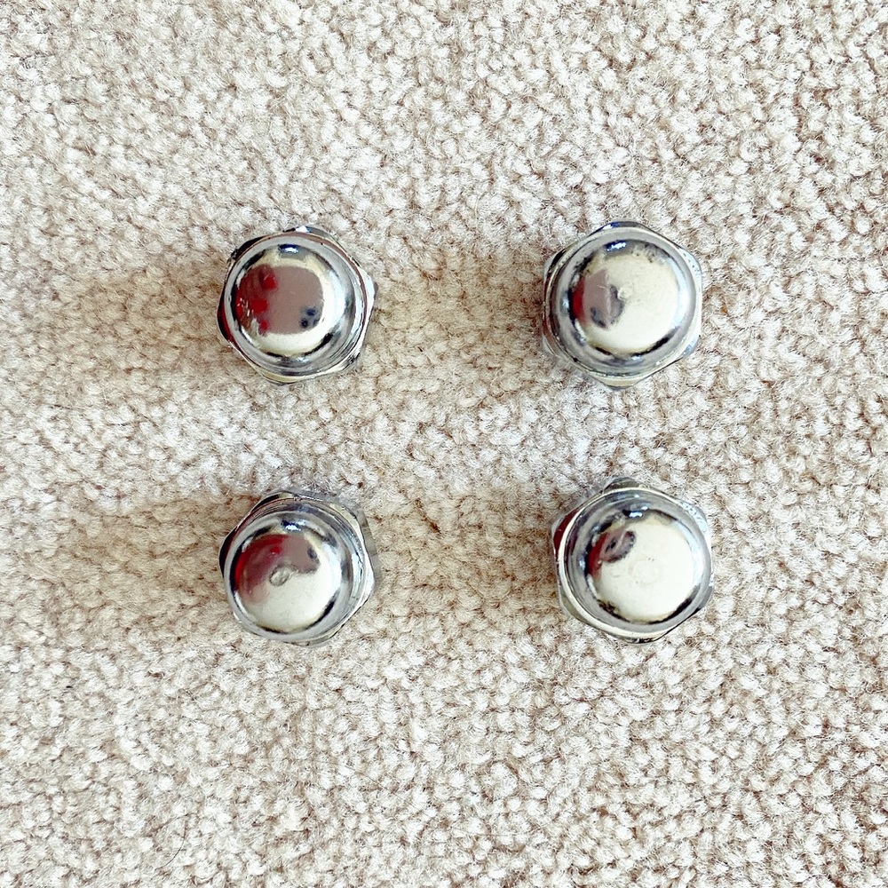 Stainless steel automotive lug nut pack